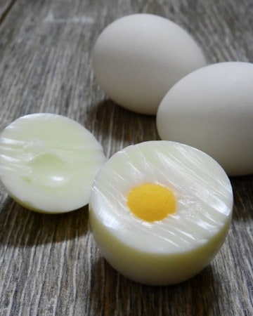 Hard boiled egg on wood counter