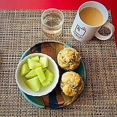 sun butter muffins for breakfast with honeydew melon and coffee