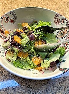 Red and green leaf lettuce with citrus segments