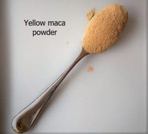 spoon full of yellow maca powder