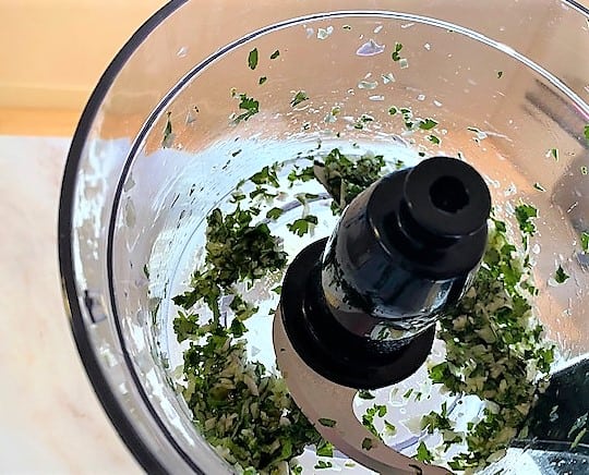 cilantro, shallot, garlic, and lime juice after blending in food processor