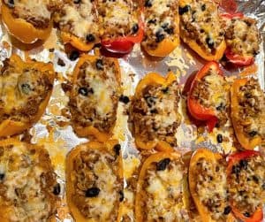 Southwestern Pepper Boats on baking sheet covered with melted cheese