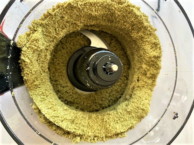 Pumpkin seed meal sticking to sides of food processor