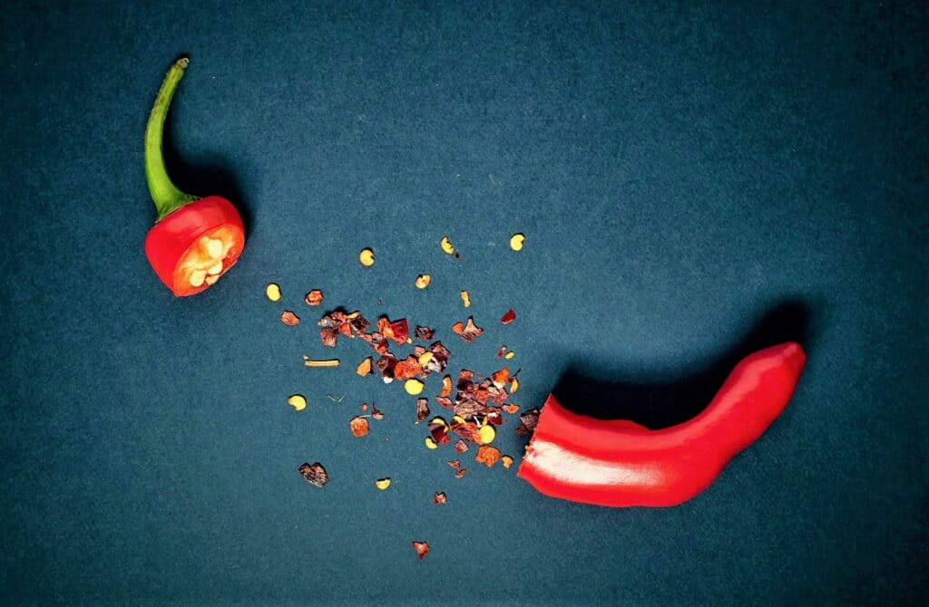 split red pepper on dark background