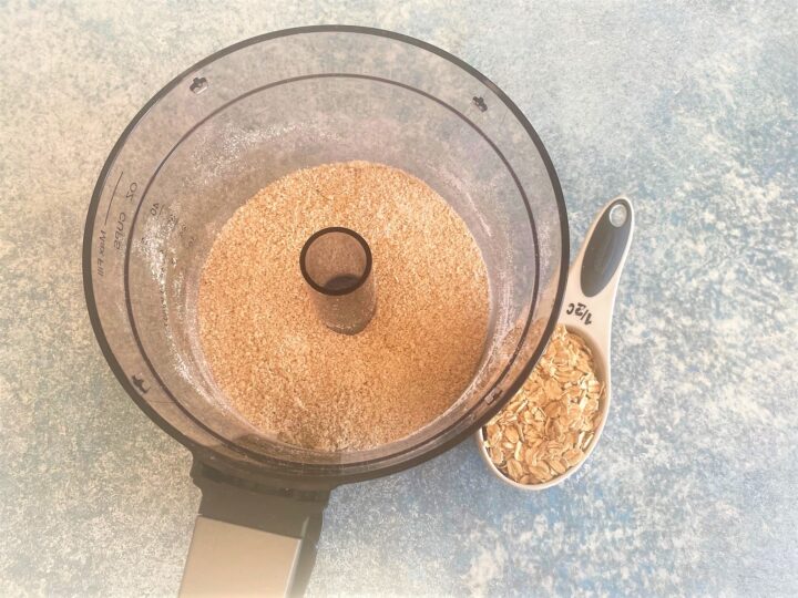 Oat flour in food processor for Banana Dog Treats with Peanut Butter