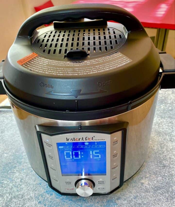 Instant Pot with display showing 15 minutes at pressure