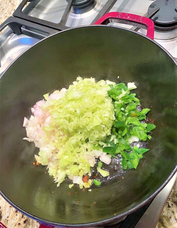 Softening the onion-celery-bell pepper in the Dutch oven to make healthy jambalya