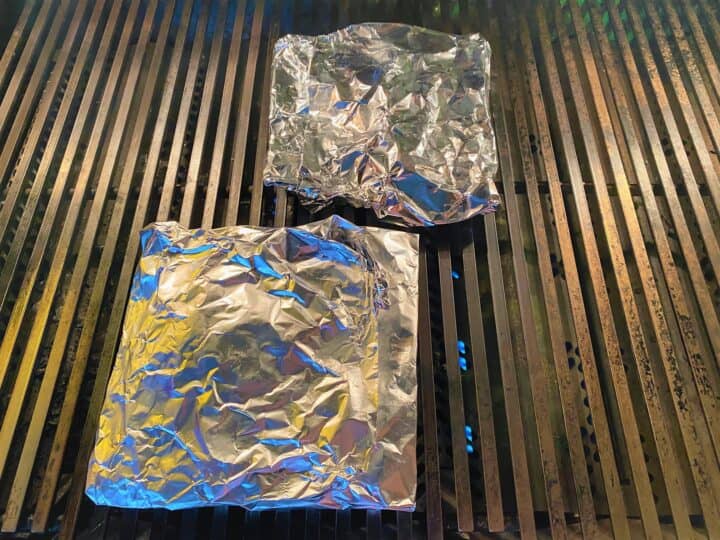 Square foil packets on grill grates