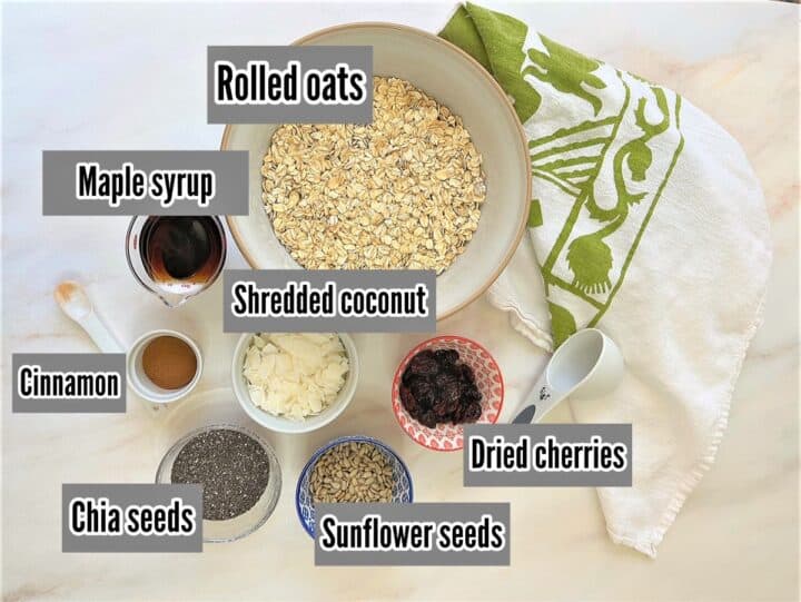 Ingredients for granola with chia with labels including oats, maple syrup, chia seeds, etc.