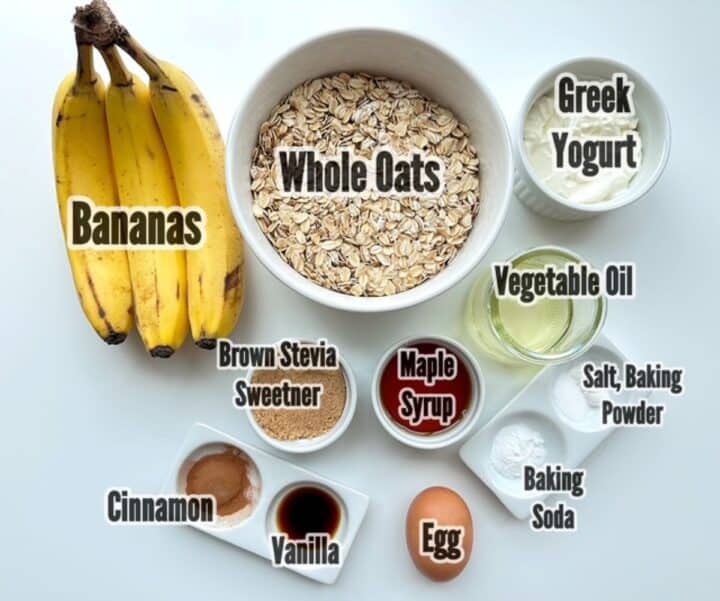 Ripe yellow bananas, whole oats, white Greek yogurt, brown egg, and other ingredients for Oat Flour Banana Bread