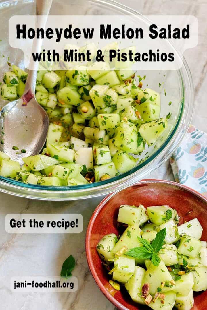 Large clear bowl filled with light green honeydew melon cubes with flecks of green mint plus a small salad bowl full of the honeydew cubes.