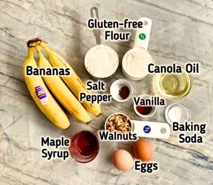 Banana muffin ingredients on the counter: bananas, GF flour, oil, maple sytrup, eggs, etc.