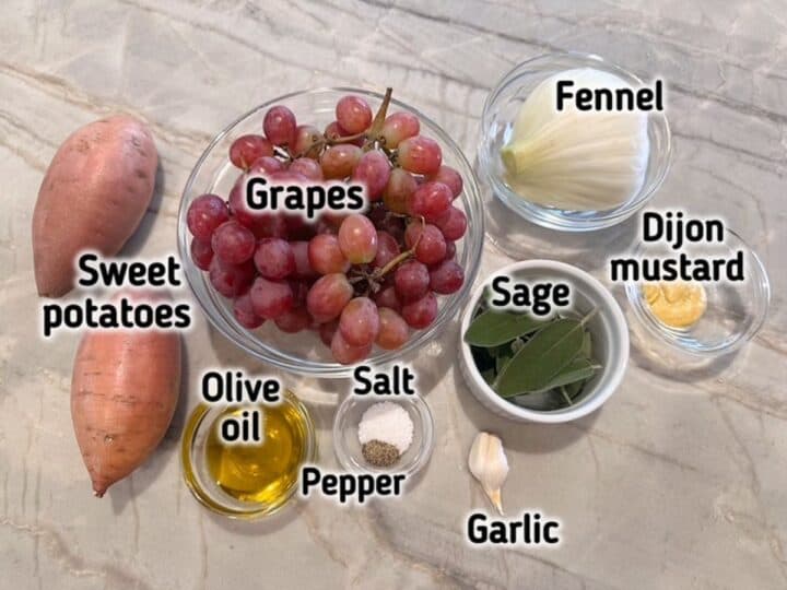 Whole orange yams, red grapes, white fennel, green sage leaves, and other ingredients.