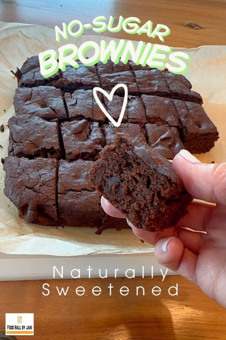 Dark, fudgy brownies held up to camera.