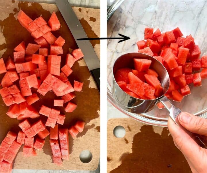 Red, juicy watermelon cubes cut and placed in a clear bowl.