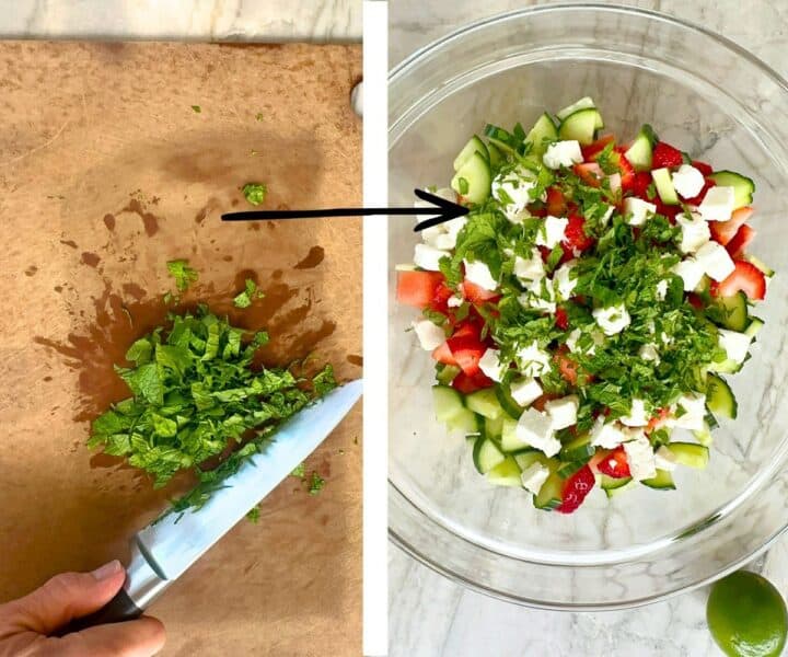 Chopped green fresh mint on a brown cutting board and added to clear bowl of watermelon strawberry cucumber salad.