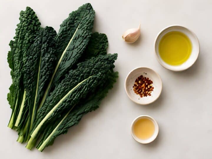 Big green leafy kale leaves and other ingredients like white balsamid vinegar for sauteed kale.