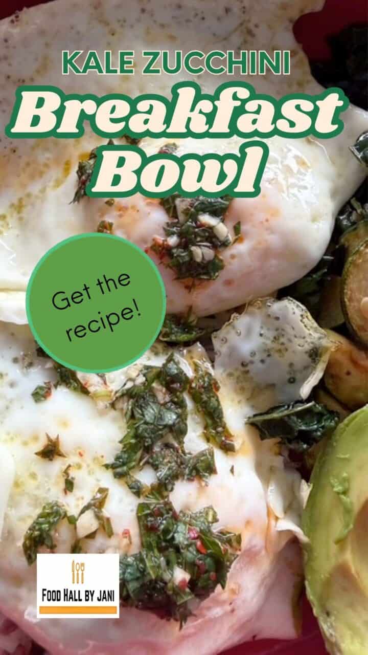 Long vertical of two fried eggs with herb seasoning over kale zucchini and grains.