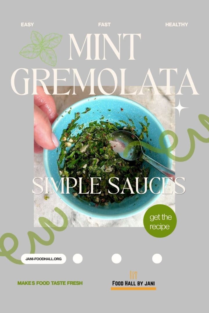 Chopped mint, garlic and ingredients in a blue bowl with text overlay Mint Gremolata